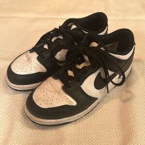 Nike dunks size 2.5Y, in good condition with minimal wear time.